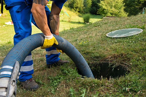 Septic tank cleaning service worker